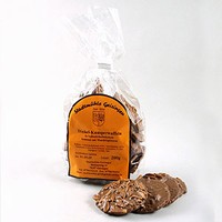 Knapperige speltwafeltjes met melkchocolade en amandelen